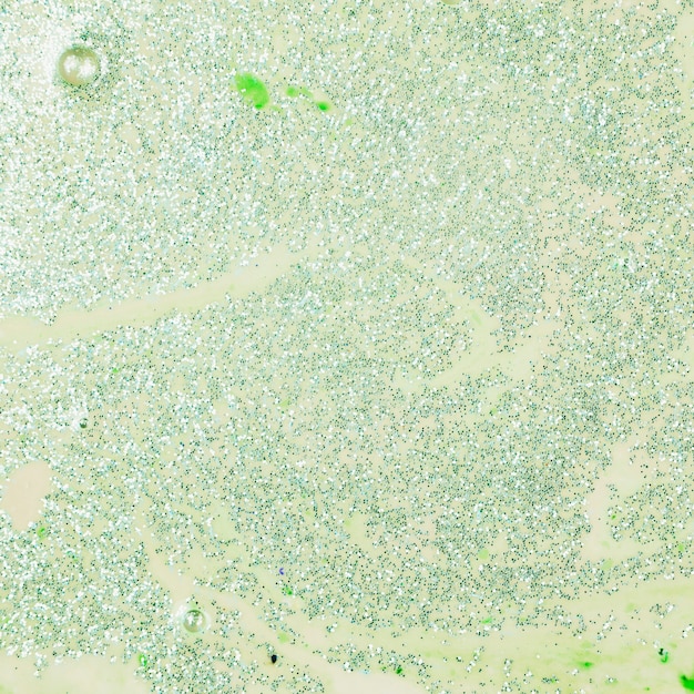 Painted green water with bright sequins