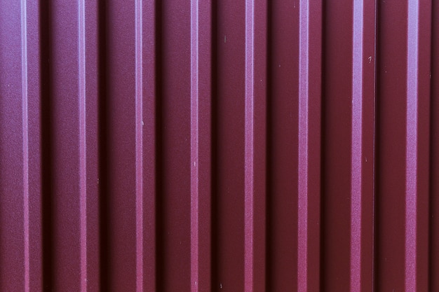 Painted metal surface with vertical lines