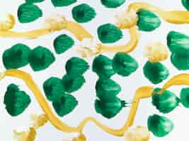 Free photo painting with green dots and yellow lines