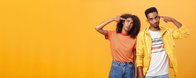 Free photo pair of african american lovers getting annoyed with parents scolding teaching them how live sexual