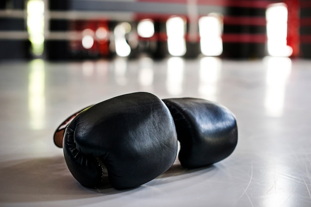 Free photo pair of black boxing gloves