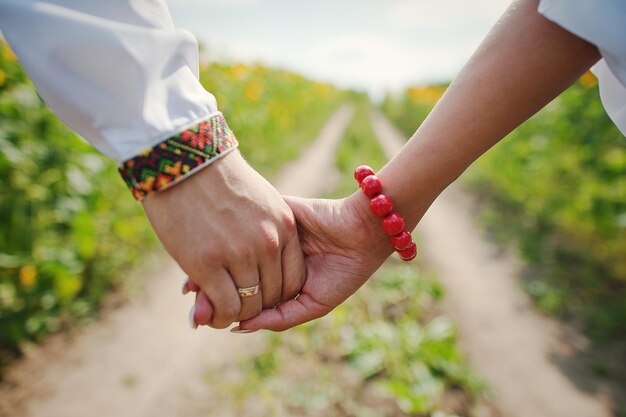 Pair of hands on background trails