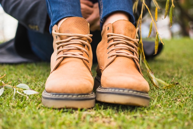 Pair of shoes on autumn grass