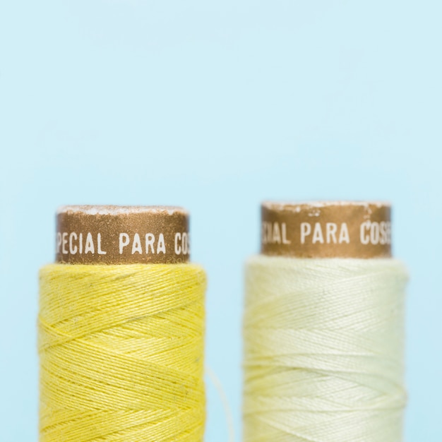 Pair of yellow thread reals