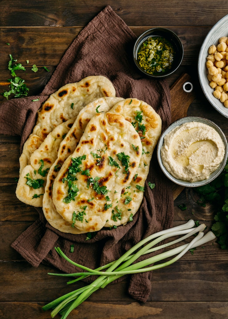 Free Photo pakistani food on cloth flat lay