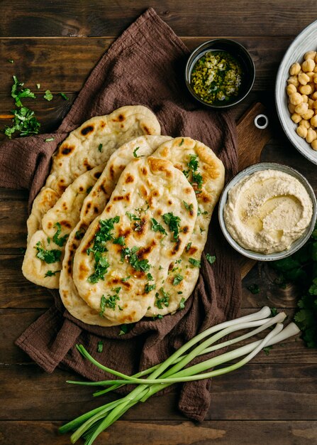 Pakistani food on cloth flat lay