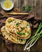 Free photo pakistani food on cloth top view