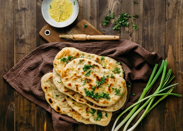 Pakistani food on wooden board above view