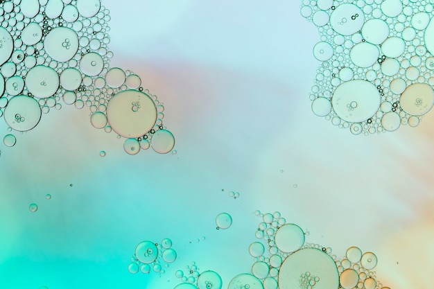 Pale watercolor background with bubbles