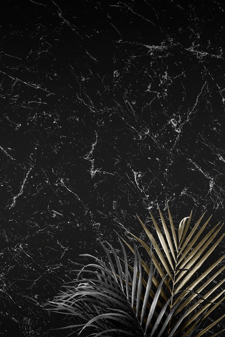 Free Photo palm leaves on a marble textured background