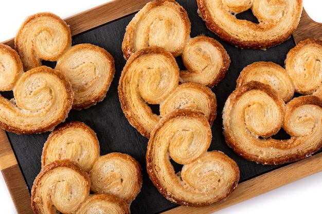 Palmier puff pastry isolated on white background.