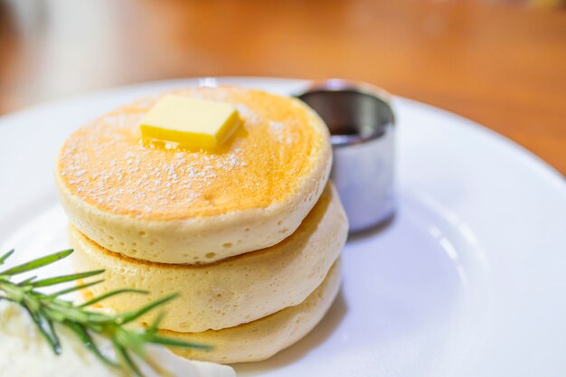 pancake with melted butter and syrup on top