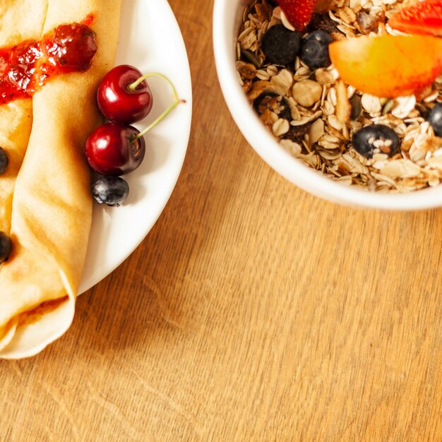 Pancakes and cereal with fruits