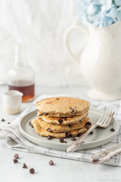 Pancakes on white ceramic plate