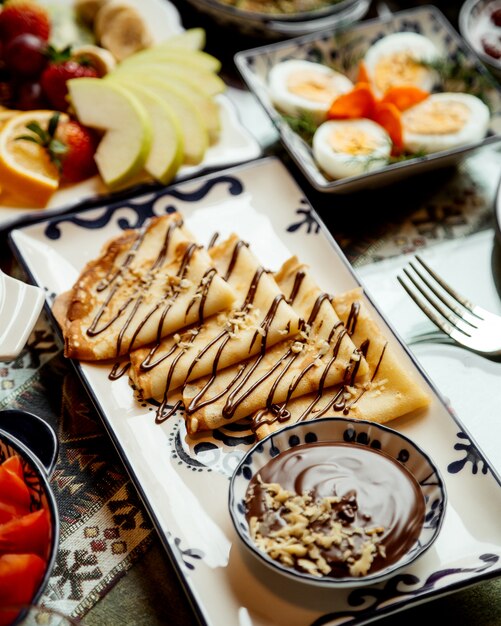 Pancakes with chocolate butter and walnuts