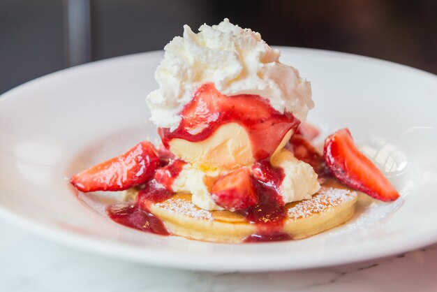 Pancakes with strawberry and ice cream