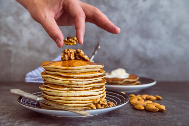 Pancakes with walnuts on top 