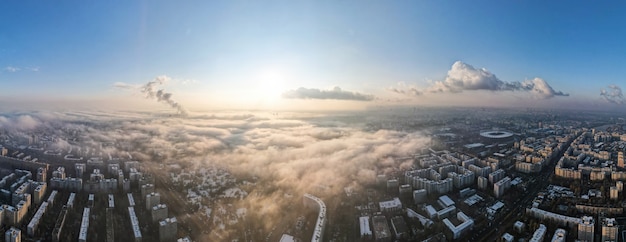 Panorama of Bucharest from a drone, districts of residential buildings, fog other the ground, Romania