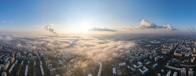 Panorama of Bucharest from a drone, districts of residential buildings, fog other the ground, Romania