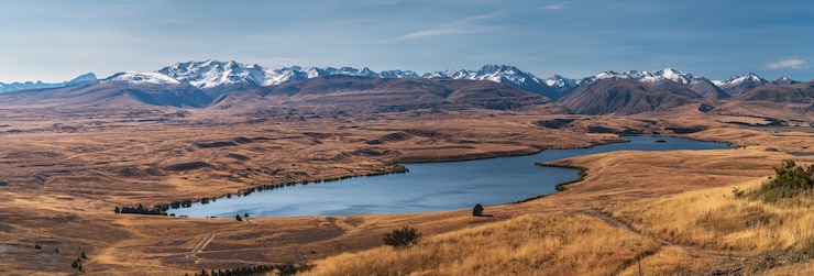 免費 Photo 亞歷山大湖的全景拍攝,在特卡波湖地區,周圍是山脈