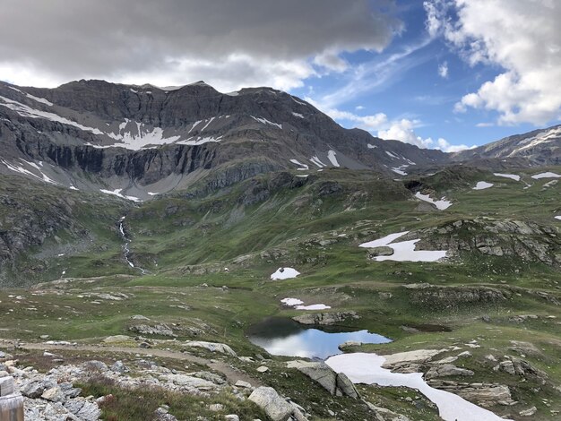 Panoramic shot of the Parco Nazionale Gran Paradiso Valnontey in Italy on a cloudy day