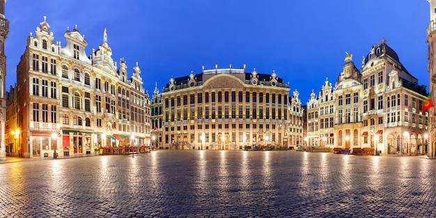 Panoramic view of beautiful houses of the grand place square at night in brussels belgium