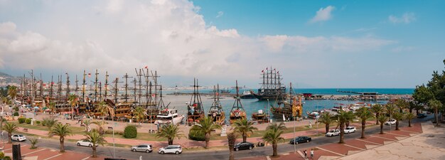 Panoramic view of sailboats in Mediterranean seashore bay