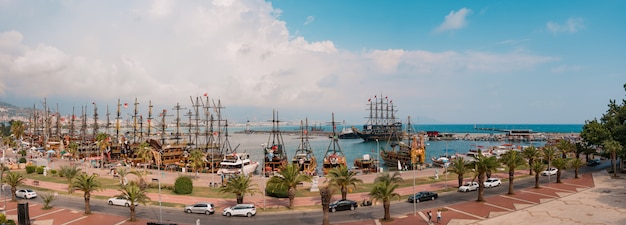 Panoramic view of sailboats in Mediterranean seashore bay