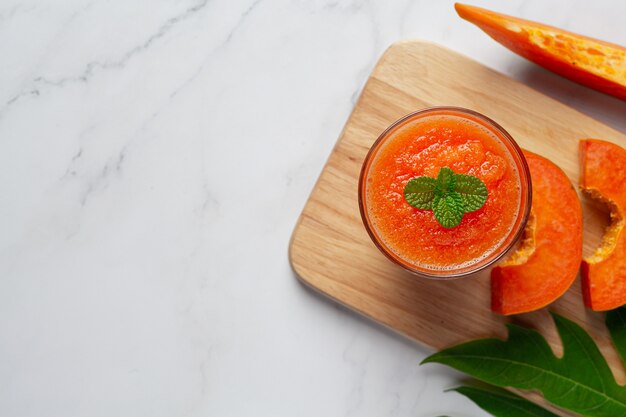 Papaya juice serve with fresh papaya chopped