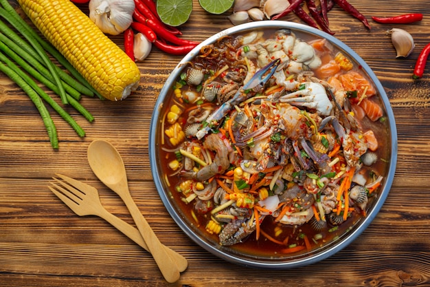 Papaya salad with crab, salmon, cockles, shrimp