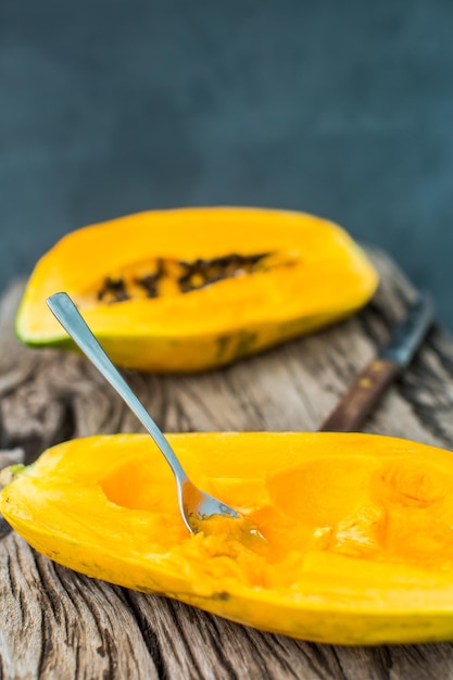 Papaya on wooden board