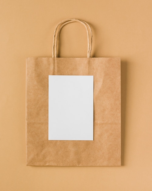 Free photo paper bag with blank paper