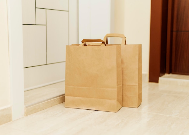 Paper bags in front of door