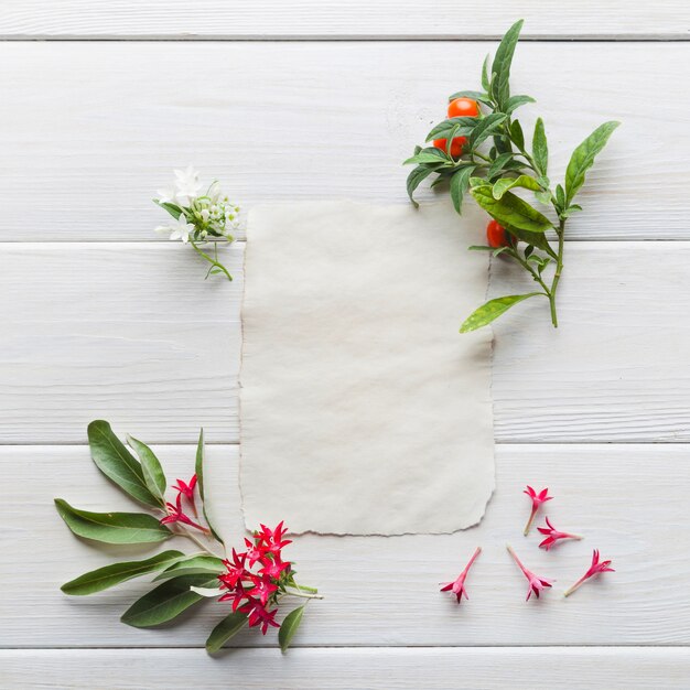 Paper card arranged with gentle flowers