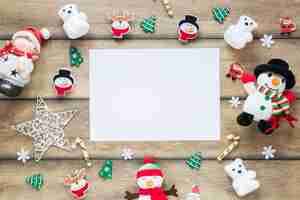 Free photo paper between christmas toys