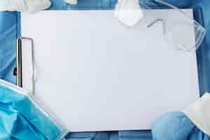 Free photo paper clipboard on doctors scrubs