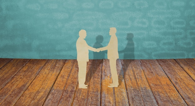 Paper cut of two business man shake hand