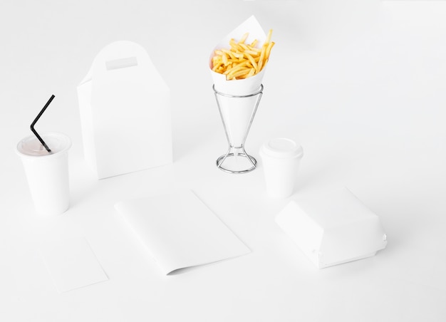 Paper fast food packaging on white background