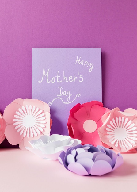 Free photo paper flowers and card arrangement