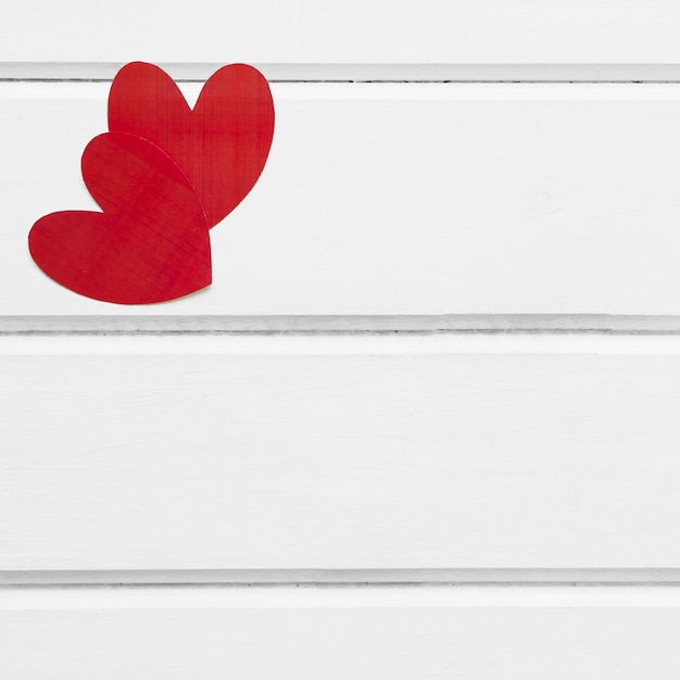 Free photo paper hearts on white background