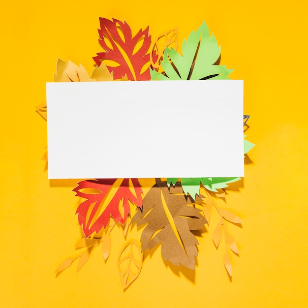 Free photo paper leaflets on yellow background