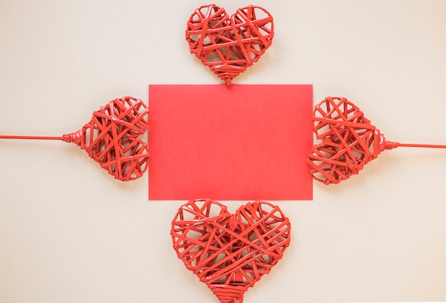 Free photo paper between ornament hearts on wands