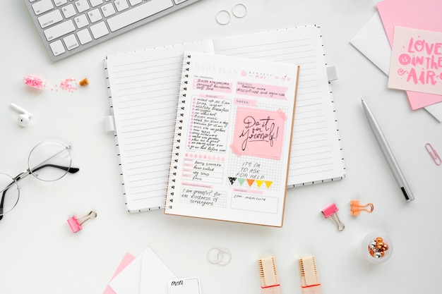 Free photo paper planner bullet journal with stationery