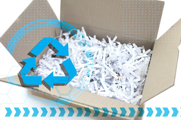 Paper recycling for saving resources,putting used paper in the box,reuse Premium Photo