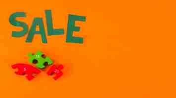 Free photo paper sale lettering on orange background