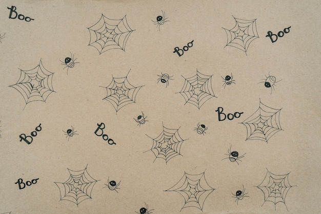 Free photo paper sheet with little spiders and tiny webs