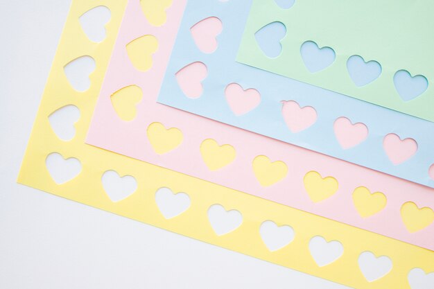 Paper sheets with carved hearts