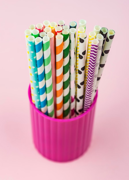 Paper straws in a cup high view