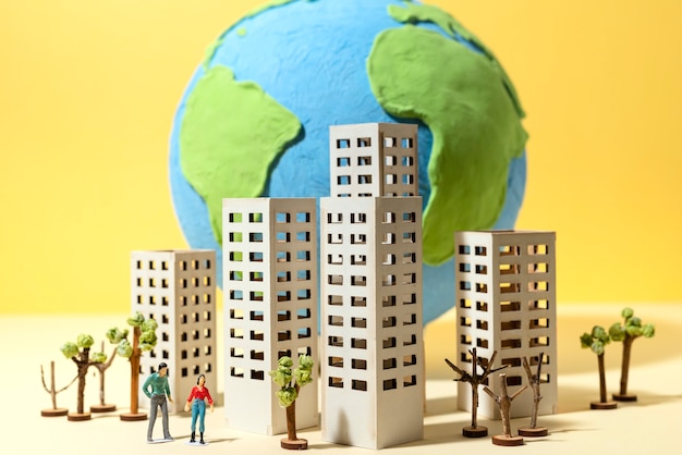 Free photo paper style earth globe with buildings