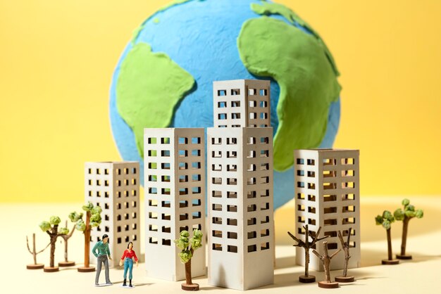Paper style earth globe with buildings